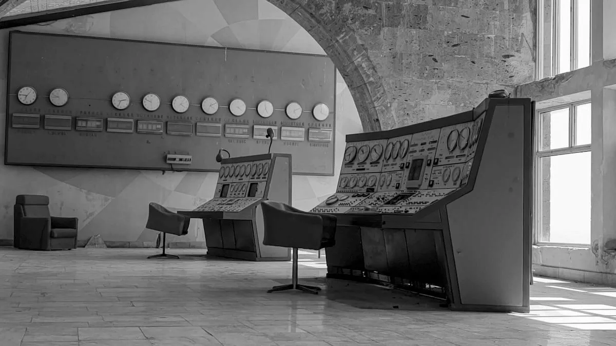 A disused control room with its instrument panels still wired in place